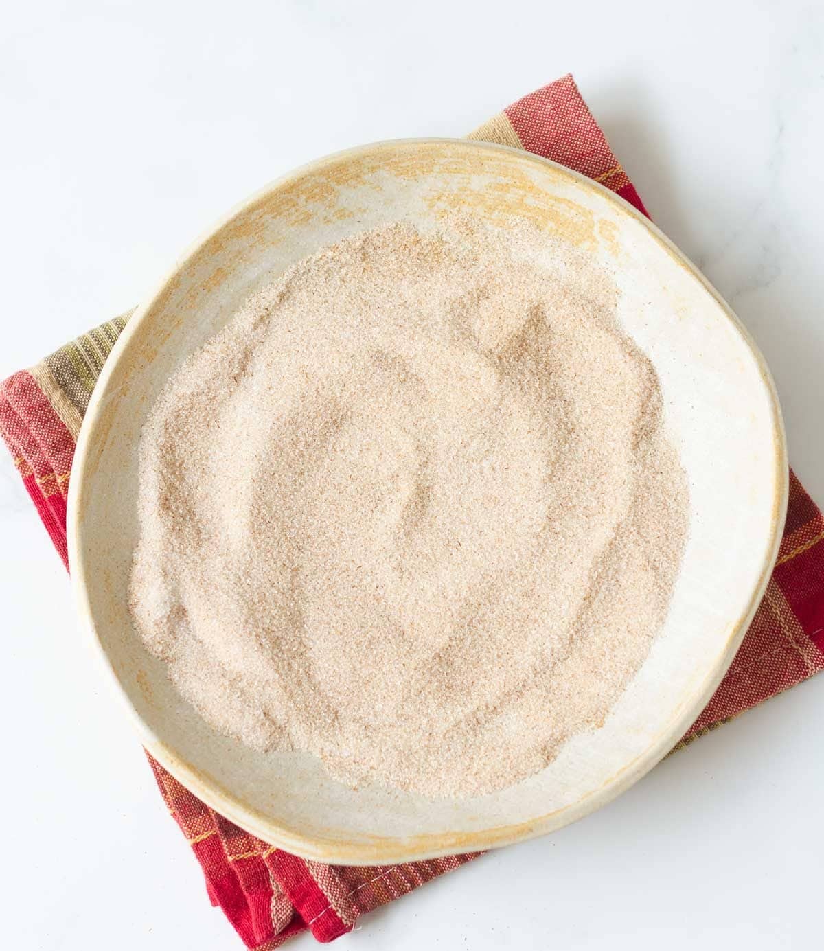 cinnamon sugar in a ceramic bowl.
