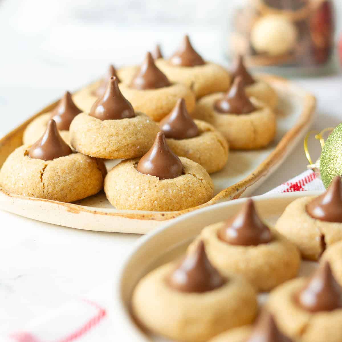 Gingerbread blossom cookies on trays.