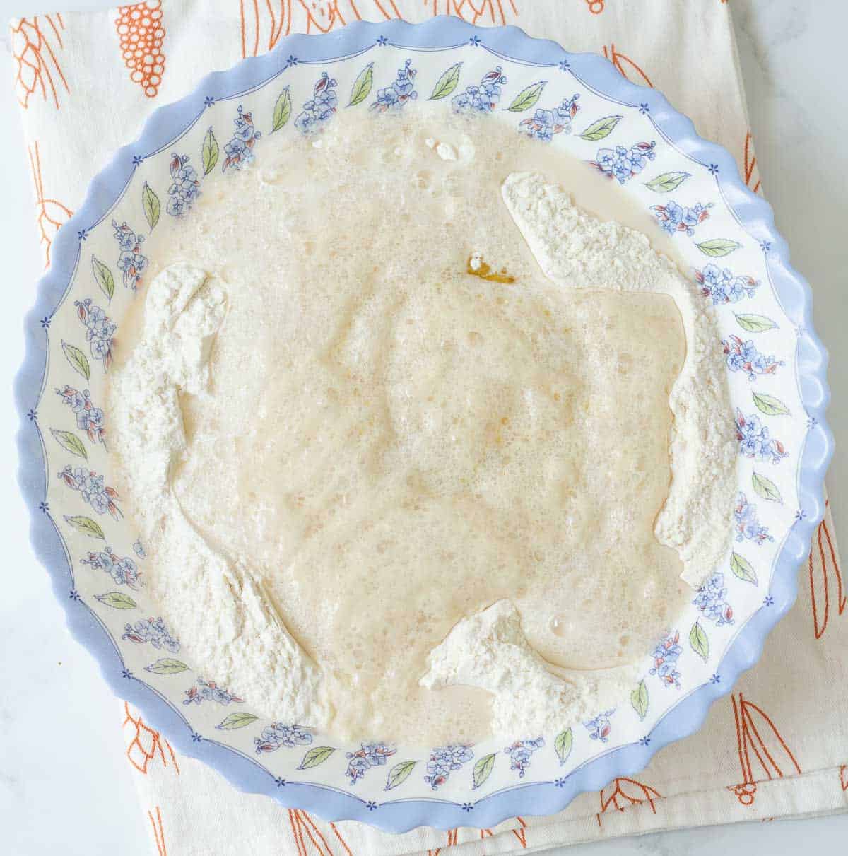 Flour and yeast water mixture in a large bowl.